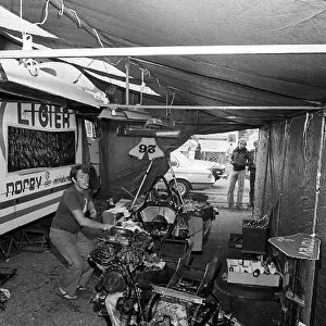 Formula One World Championship: A Ligier mechanic prepares a Ligier JS7 with its Matra V12 engine in the paddock