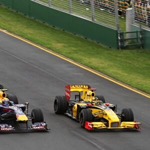 Formula One World Championship: Mark Webber Red Bull Racing RB6 and Robert Kubica Renault R30