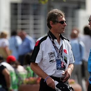 Formula One World Championship: Martin Broughton, chairman of British Airways talks with Flavio Briatore Renault Team Principal