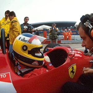 Formula One World Championship: Michele Alboreto talks with his engineer