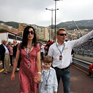 Formula One World Championship: Mika Hakkinen with son Hugo and wife Erja