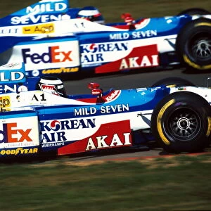 Formula One World Championship: Mirror image of Benetton drivers, Gerhard Berger Benetton and Jean Alesi Benetton
