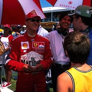 Formula One World Championship: Nicholas Cage and his son meet Formula 1 Champion Michael Schumacher on the grid