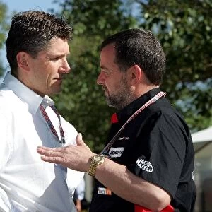 Formula One World Championship: Nick Fry BAR Team Principal talks with Paul Stoddart Minardi Team Principal