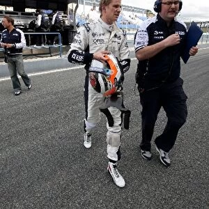 Formula One World Championship: Nico Hulkenberg Williams with Tom McCullough AT&T Williams Test Team Manager walks in after stopping on the track