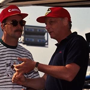Formula One World Championship: Nigel Mansell, left, talks with ex F1 World Champion Niki Lauda