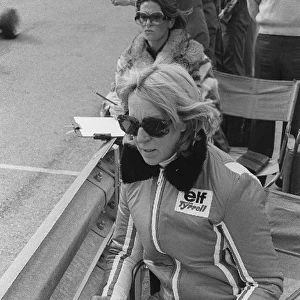 Formula One World Championship: Norah Tyrrell, wife of Ken Tyrrell Tyrrell Team Owner, performs lap timing duties from the pit wall