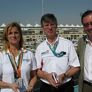 Formula One World Championship: Peter Stayner Executive Sporting Director Yas Marina Circuit, centre, with Douglas Breen, right