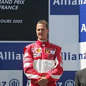 Formula One World Championship: Third place finisher Michael Schumacher Ferrari on the podium