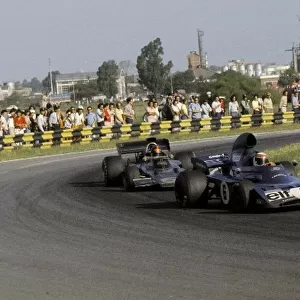 Formula One World Championship: Third placed Jackie Stewart Tyrrell 005 was able to hold off race winner Emerson Fittipaldi Lotus 72D until lap