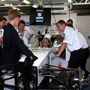 Formula One World Championship: Prince Harry in the Stewart Ford garage during the British Grand Prix at Silverstone