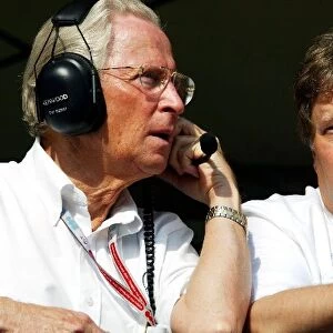Formula One World Championship: Professor Jurgen Hubbert Daimler Chrysler talks with Norbert Haug Mercedes Sporting Director