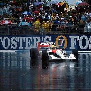 Formula One World Championship: Race winner Ayrton Senna McLaren MP4 / 6 leads in the appalling conditions that stopped the race after 14 of the