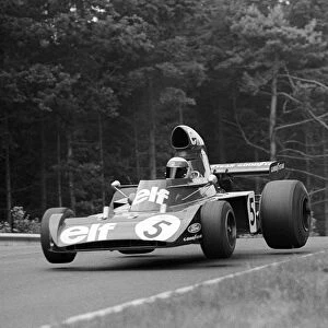 Formula One World Championship: Race winner Jackie Stewart Tyrrell 006 leaves the air on a jump a little way past Pflanzgarten