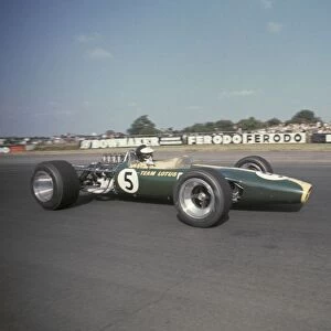 Formula One World Championship: Race winner Jim Clark Lotus Ford 49