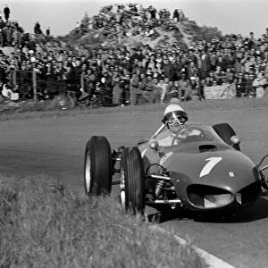 Formula One World Championship: Reigning World Champion Phil Hill Ferrari 156 finished third in the opening race of the season