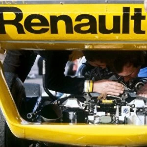 Formula One World Championship: Renault mechanics work on the rear of the Renault RS11 of Jean-Pierre Jabouille, who took the first ever GP vicrtory