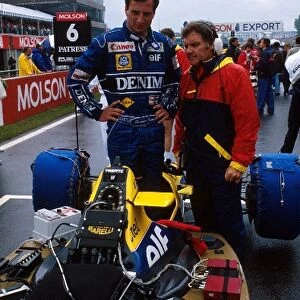 Formula One World Championship: Riccardo Patrese Williams Renault FW13B speaks to Patrick Head Williams Technical Director, right on the grid
