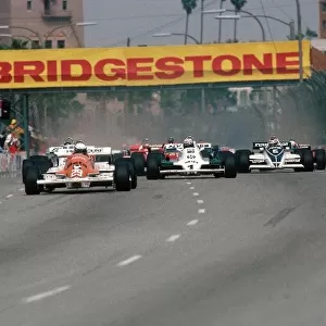 Formula One World Championship: Riccardo Patrese Arrows A3 leads from pole position at the start. He led for 24 laps