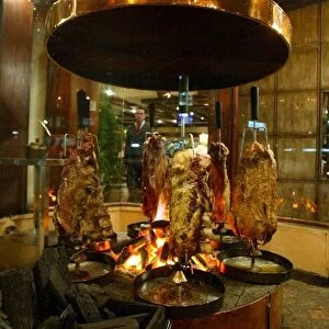Formula One World Championship: Roasting meat at the Foga da Chao restaurant in Sao Paulo, a favourite with F1 folk