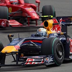 Formula One World Championship: Sebastian Vettel Red Bull Racing RB5 leads Kimi Raikkonen Ferrari F2009