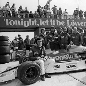 Formula One World Championship: Sixth and seventh placed McLaren team mates Patrick Tambay and James Hunt with the McLaren M26 and the team