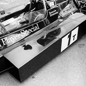 Formula One World Championship: The spare Lotus 76 was tested complete with huge taped on air ducts in a bid to cure a tendancy for the car to