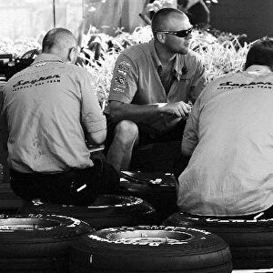 Formula One World Championship: Spyker team members take a break