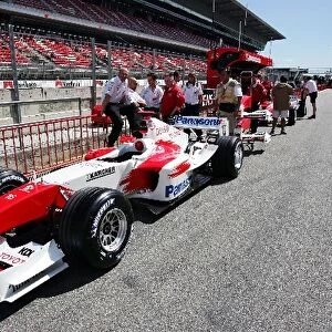 Formula One World Championship: A Toyota TF104 in the pit lane