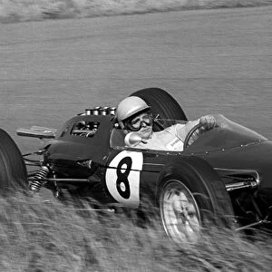 Formula One World Championship: Trevor Taylor Lotus 25 was classified tenth despite only completing 66 of the scheduled 80 laps