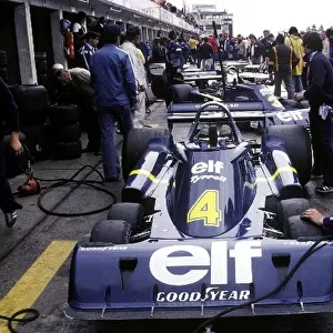 Formula One World Championship: The Tyrrell P34 of Patrick Depailler, who crashed on the opening lap of the restarted race, sits in the pits