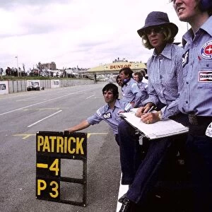 Formula One World Championship: The Tyrrell team hang out a pit board for Patrick Depailler Tyrrell, who finished the race in third position