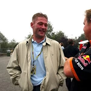 Formula One World Championship: Unemployed racing driver Jos Verstappen talks with a former Arrows colleague