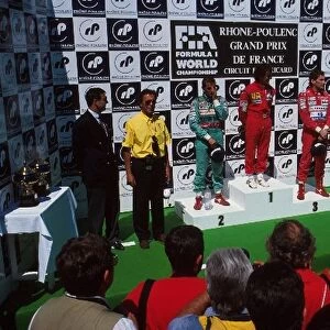 Formula One World Championship: Winner Alain Prost, centre, with second place Ivan Capelli, left, and third place Ayrton Senna