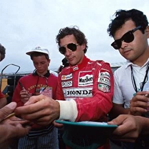 Formula One World Championship: Winner Ayrton Senna McLaren MP4 / 6 signs autographs for the fans