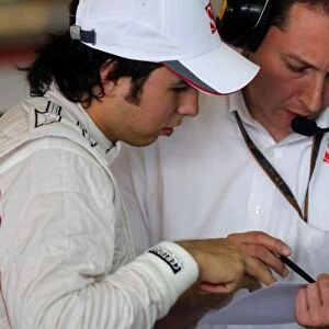 Formula One Young Driver Test: Sergio Perez BMW Sauber talks with Paul Russell BMW Sauber Race Engineer