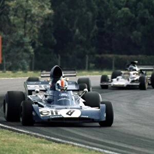Francois Cevert leads Emerson Fittipaldi and Ronnie Peterson