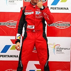 GP2 Asia Series: Race winner Luca Filippi Qi-Meritus celebrates on the podium, later to be disqualified