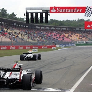 GP2 Series: Romain Grosjean ART crosses the line to win