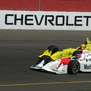 Helio Castroeves, (BRA), and Sam Hornish, (USA), raced their Dallara / Chevrolets hard all day long at the Copper World 200. Phoenix, Az. March