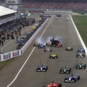 Hockenheim, Germany. 29th July 2001: Luciano Burti, Prost Acer AP04, is launched into the air, after crashing into the back of the slowing Ferrari