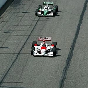 Indy Racing League: Race winner Helio Castroneves Penske Racing G-Force Toyota leads Tony Kanaan Andretti Green Racing Dallara Honda, who finished