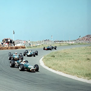 Jack Brabham leads Denny Hulme and Jim Clark and Graham Hill