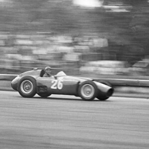Juan Manuel Fangio (in Peter Collins Lancia-Ferrari: Action, clinching the World Championship for the fourth time