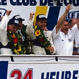 Le Mans 24 Hour Race: The Silk Cut Jaguar team celebrate their 1-2 finish on the podium: Price Cobb winner; Eliseo Salazar winner; John Nielsen