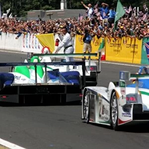 Le Mans 24 Hours: Tom Kristensen Champion Racing Audi R8 crosses the line to score a record seventh Le Mans 24 Hours win
