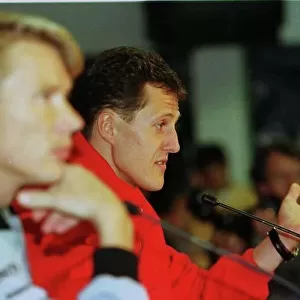 LUXEMBOURG GP - NUBURGRING 24 SEPT 1998 MICHEAL SCHUMACHER AND MIKA HAKKINEN HEAD TO HEAD DURING THE PRE WEEKEND PRESS CONFERENCE PHOTO: STEVE ETHERINGTON