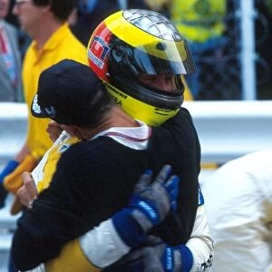 Monaco Formula Three: Ralf Schumacher receives a hug from his brother Michael after finishing second