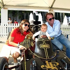 Montjuich Park: Emerson Fittipalidi, right, wife Teresa Fittipaldi, and son Luca Fittipaldi with the Lotus 72E
