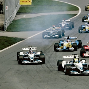 Montreal, Canada. 13th - 15th June 2003: Ralf Schumacher, BMW Williams FW25, leads at the start of the race